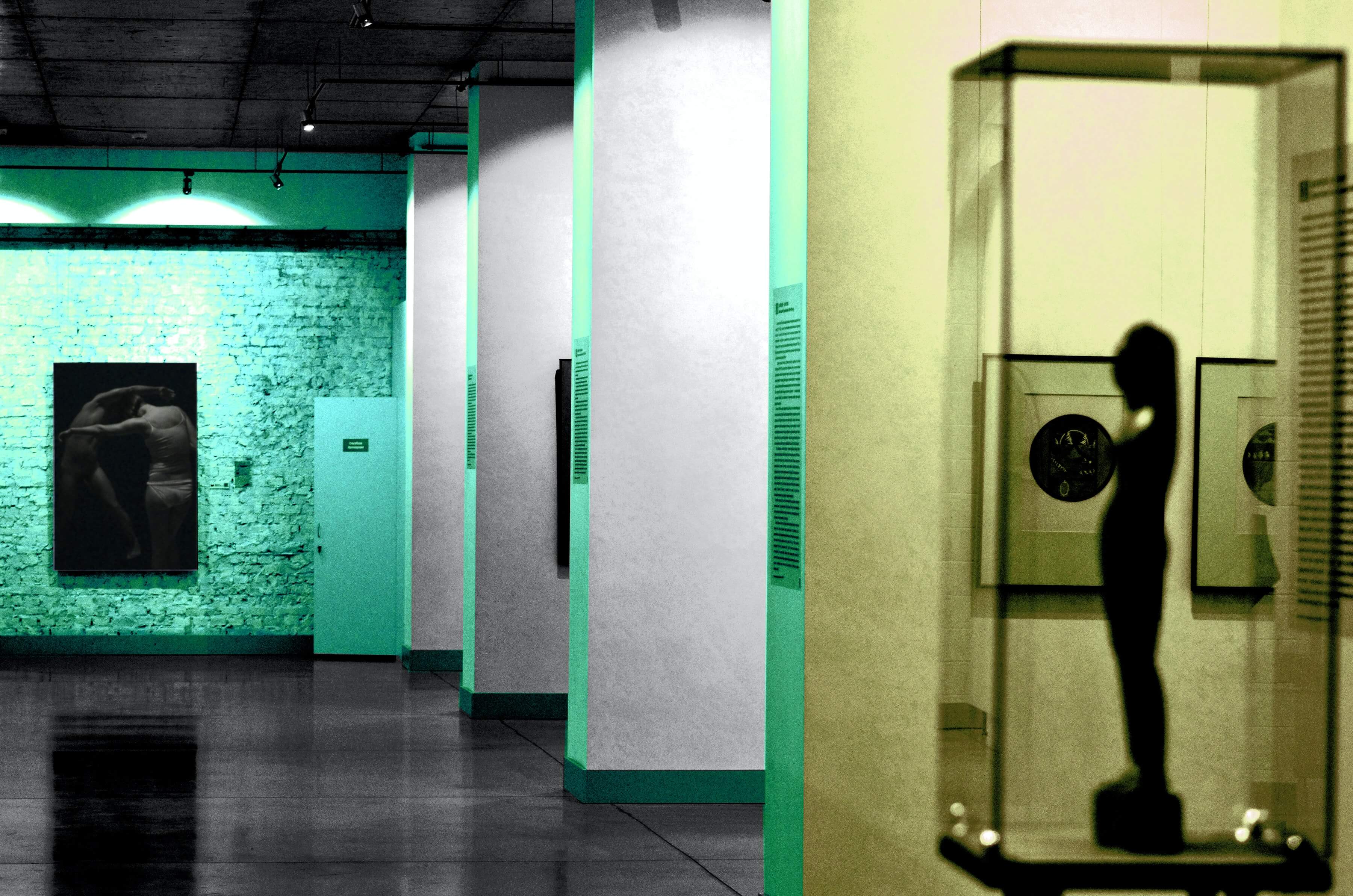 Contemporary gallery illuminated in green